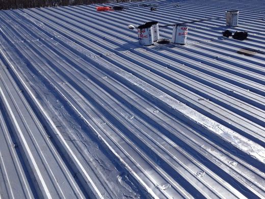 Roof coating, restoration and maintenance